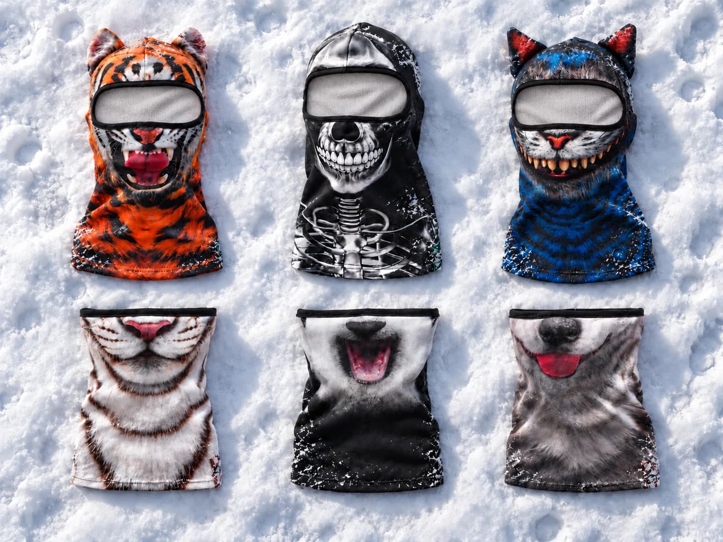 Flat-lay on snow — Roaring Tiger, Skull and Cheshire Cat balaclavas above three buffs